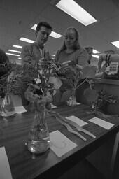 Biology students with plants.