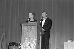 Hosts Jody Cameron and Ian Fenwick at awards ceremony.